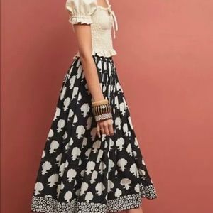 Breathtaking Monochromatic designer midi skirt.